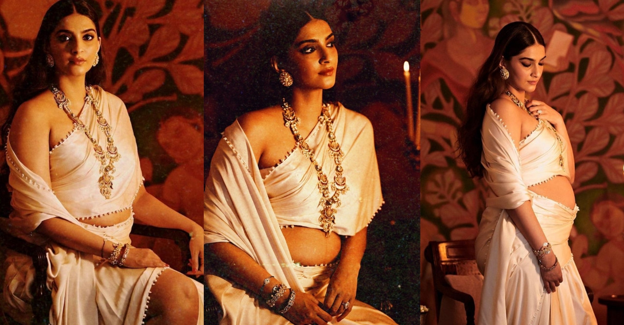 সাদা শাড়ি জড়িয়ে বেবি বাম্পের ছবি প্রকাশে আনেন সোনম কাপুর